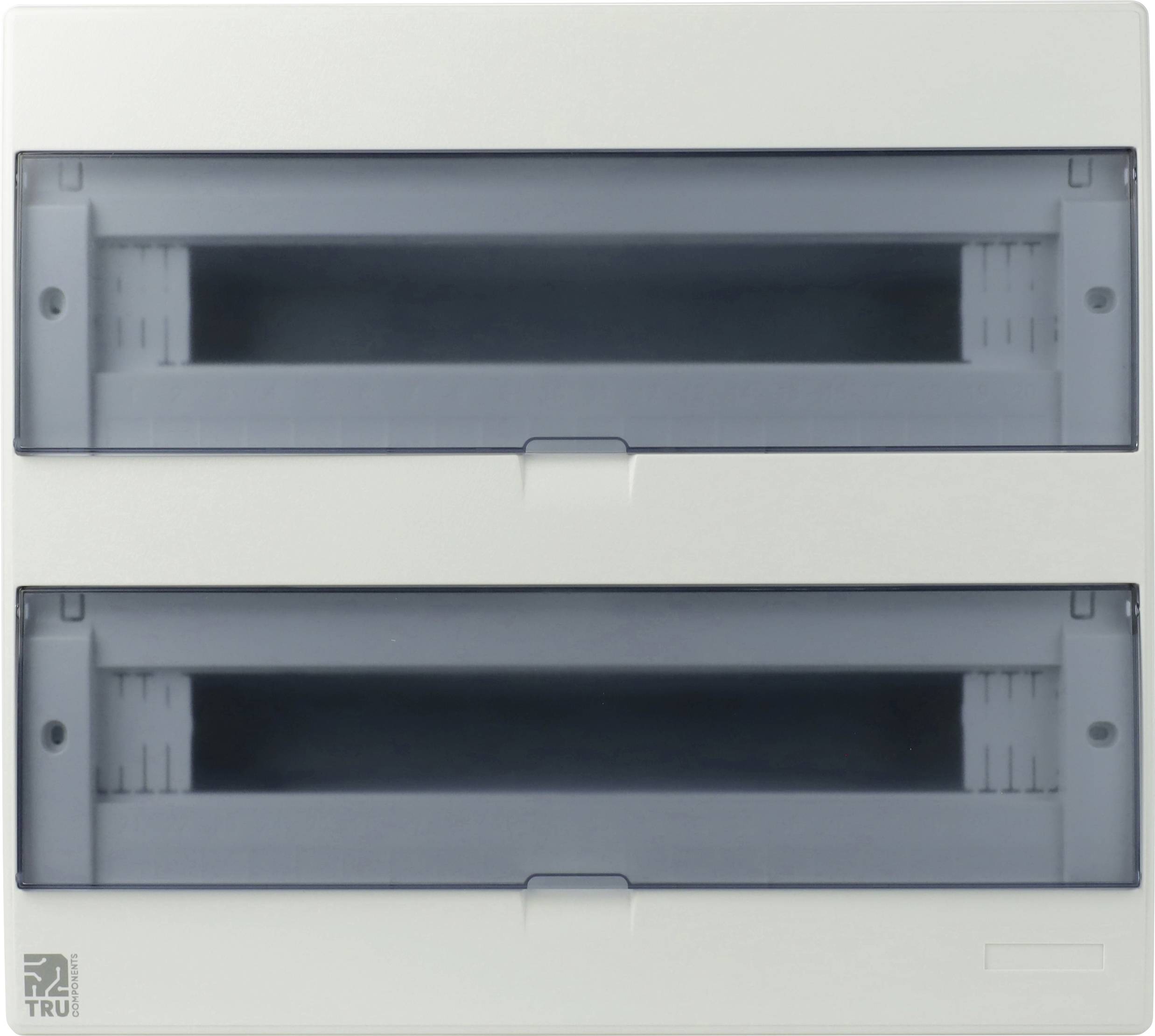 Un panneau de distribution électrique avec deux portes transparentes fermées, utilisé pour abriter des disjoncteurs ou des composants de fusibles, est visible.