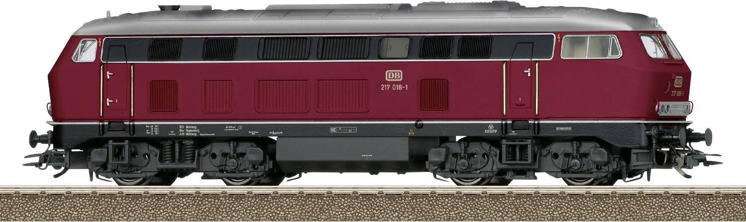 Une locomotive rouge de la série BR 217 est stationnée sur une voie ferrée. Elle est représentée de profil, montrant des détails tels que ses roues et ses fenêtres.