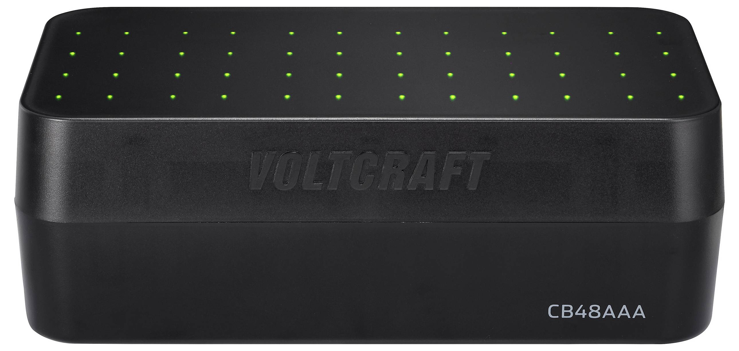 Un dispositif rectangulaire noir étiqueté « Voltcraft CB48AAA » avec de petites lumières indicatrices vertes sur la surface, probablement un chargeur de batterie.