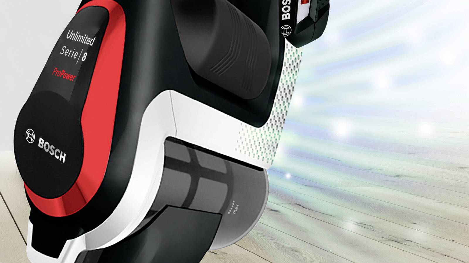 'Aspirateur Bosch Série Unlimited 8 ProPower sur sol dur, affichant la puissance d'aspiration avec un effet de mouvement, mettant en valeur l'efficacité du produit.'