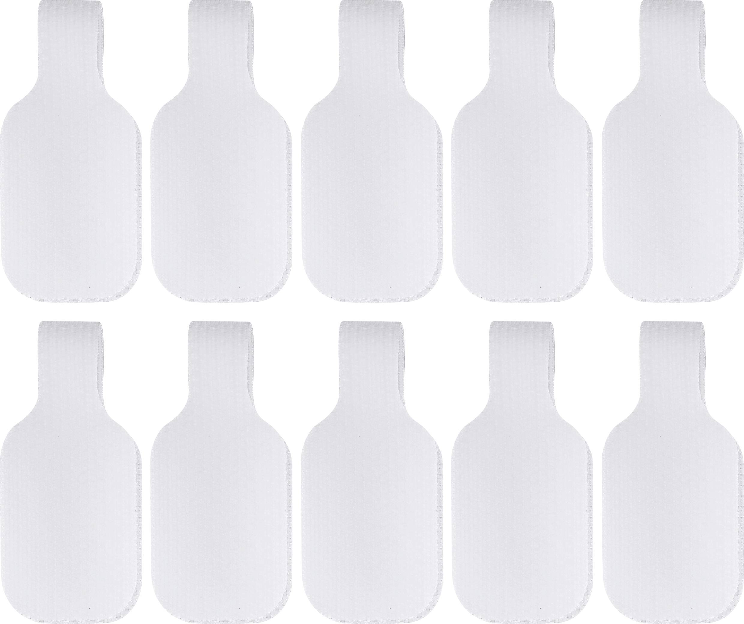Dix pansements adhésifs blancs disposés en deux rangées de cinq chacune.