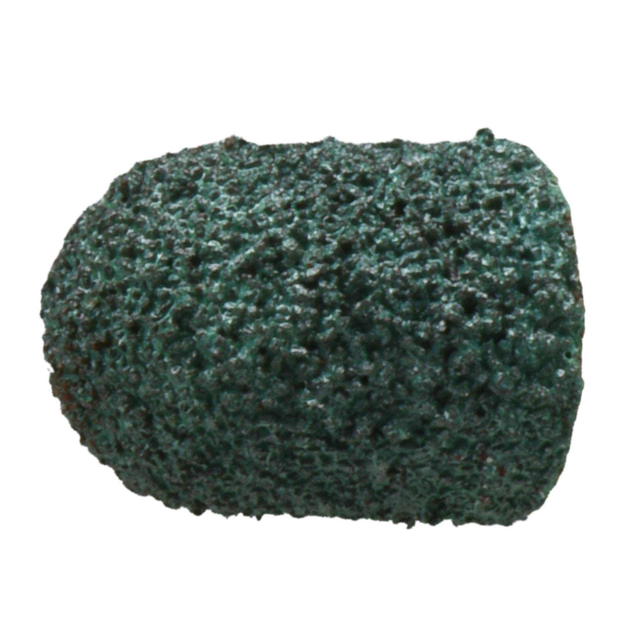 Une petite pierre à la texture rugueuse, de couleur vert-bleu canard, à la forme arrondie, ressemblant à une pierre ponce.