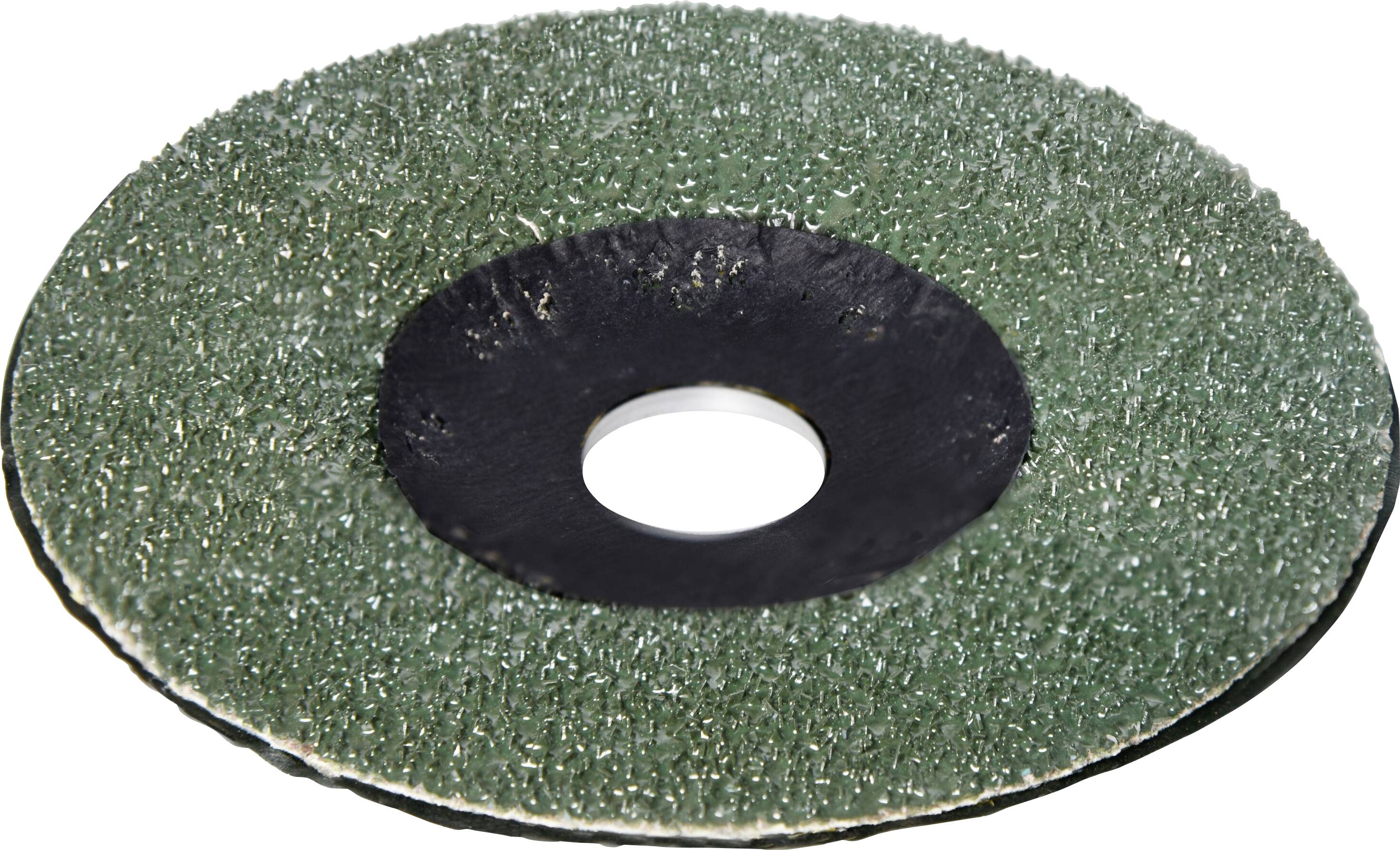 Une roue de meulage verte, texturée, avec un trou central noir, utilisée pour l'enlèvement de matière sur des surfaces.