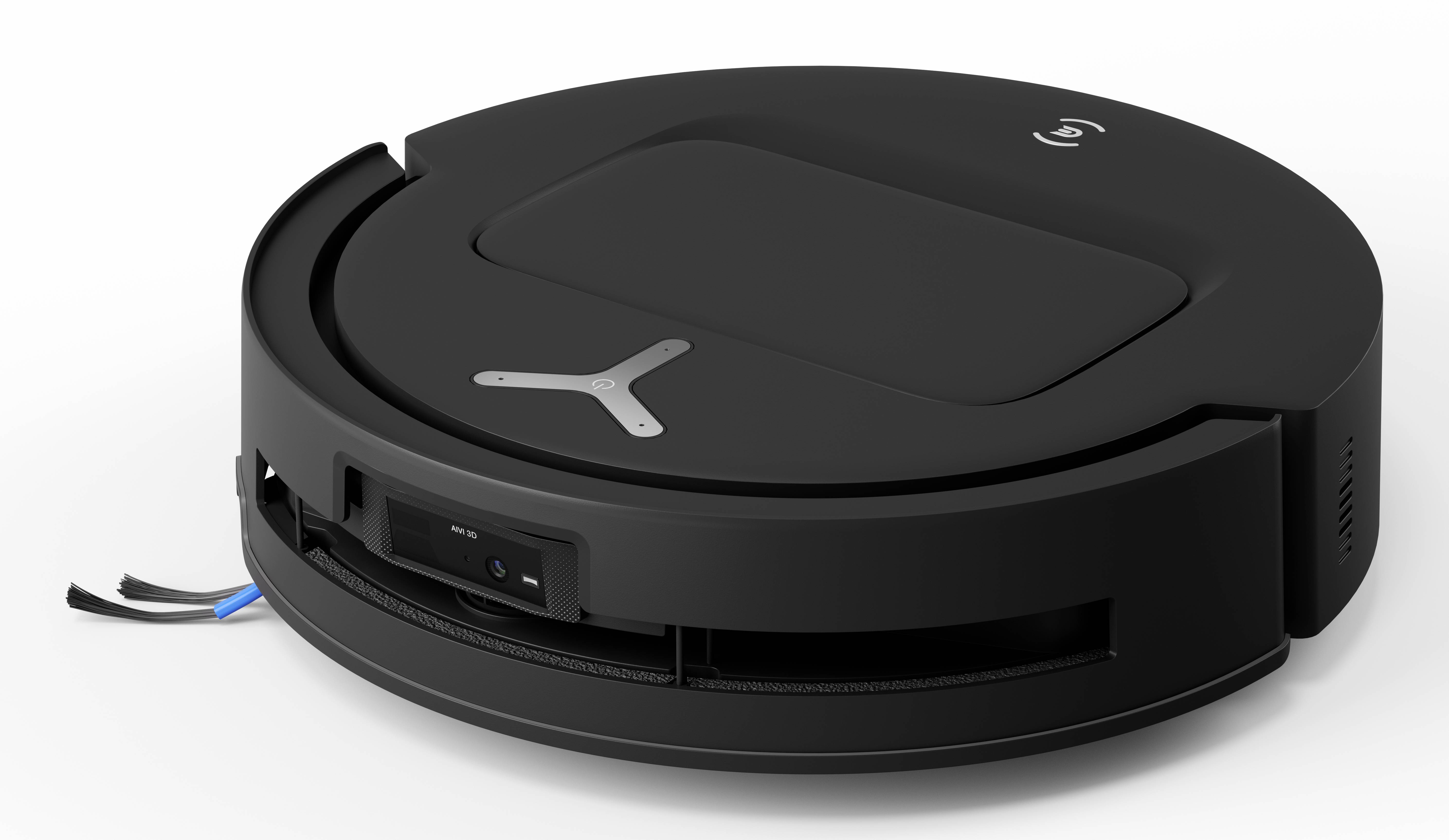 Un aspirateur robot noir et rond sur une surface blanche, montrant sa vue de dessus avec un couvercle central et un petit logo.