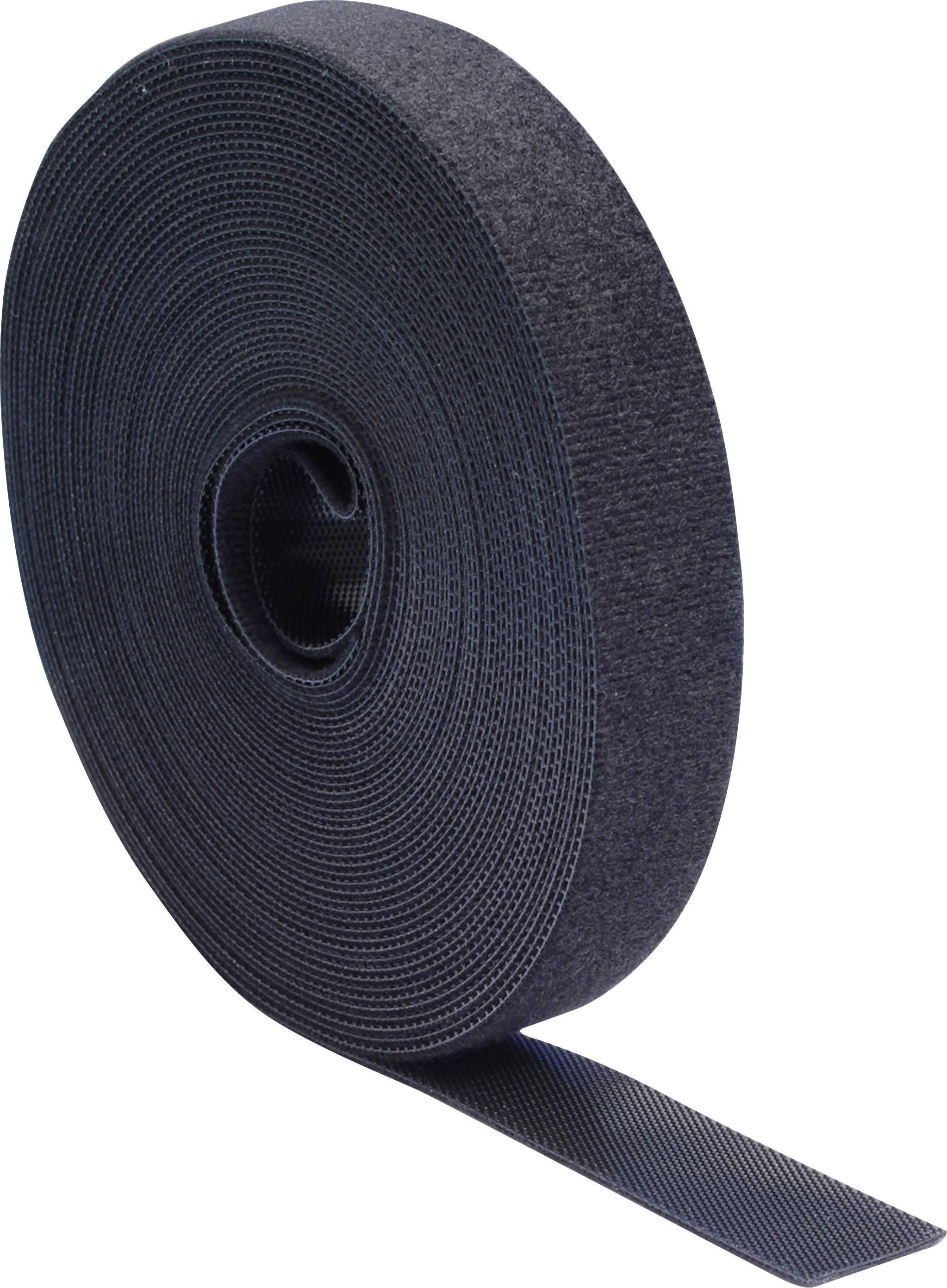 Un rouleau de ruban adhésif à crochets et boucles noir, partiellement déroulé, montrant sa surface texturée et son épaisseur.