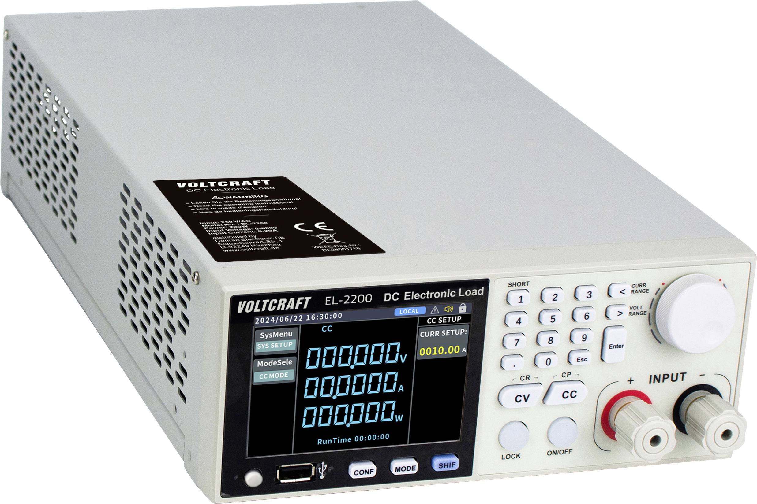 Un voltmètre étiqueté « Voltcraft EL-2200 DC Electronic Load » affiche des mesures sur un écran, avec des boutons d'entrée et de contrôle.