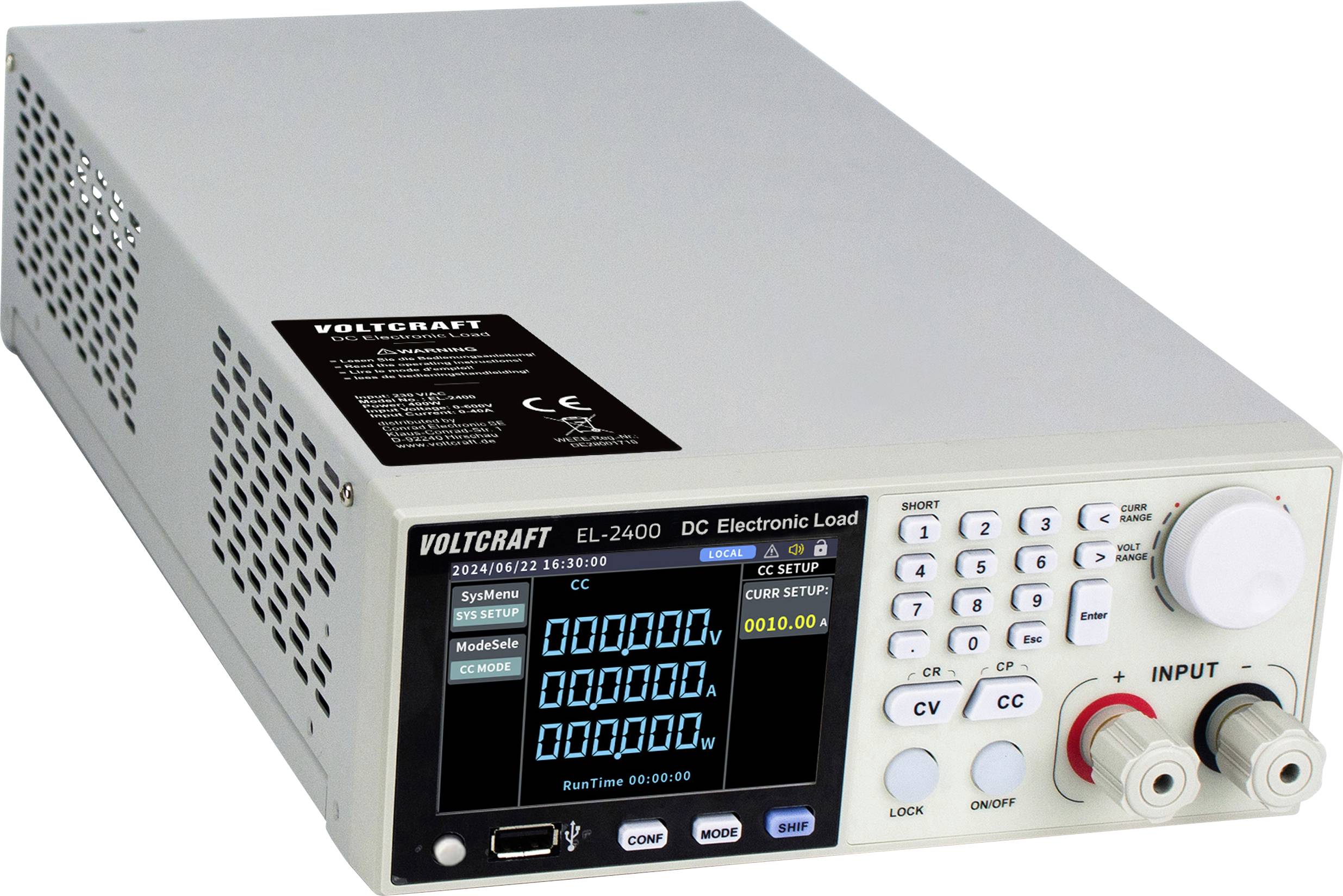 Un appareil Voltcraft EL-2400 Electronic Load CC avec un affichage numérique montrant des lectures chiffrées, des boutons de commande et des bornes d'entrée.