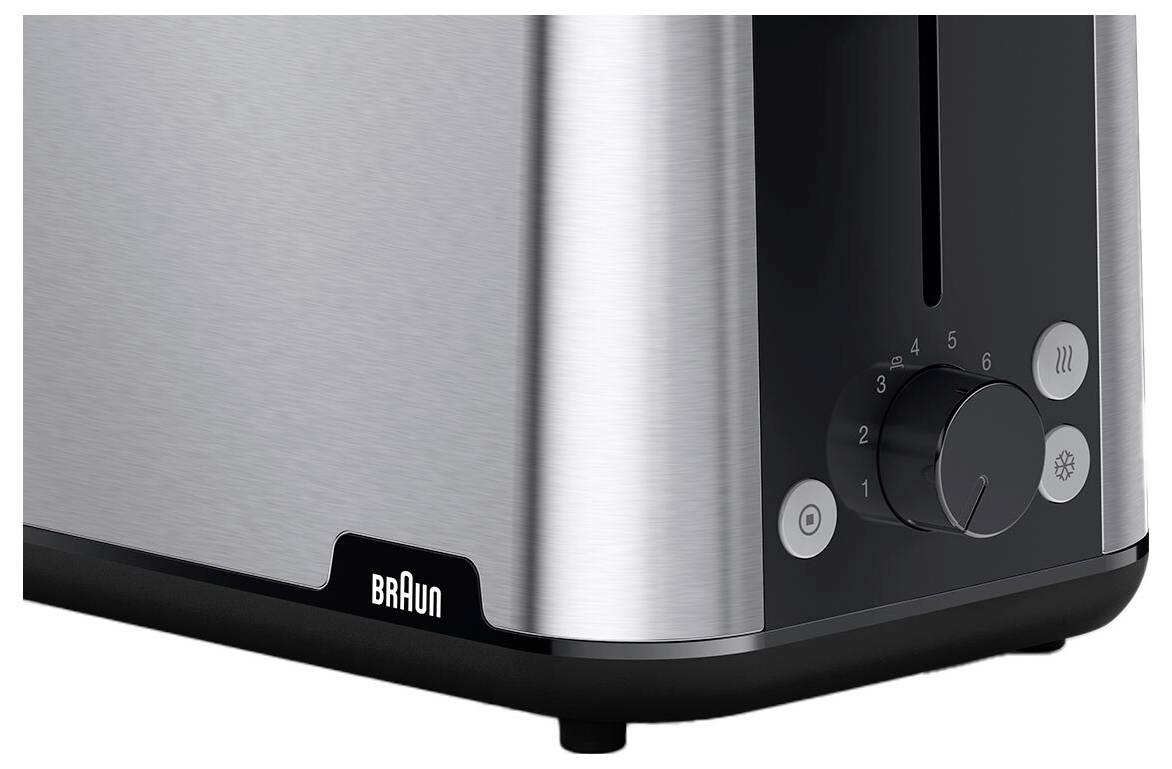 Un gros plan sur un grille-pain élégant et moderne avec un cadran indiquant des réglages de 1 à 6, arborant la marque Braun sur sa surface métallique.