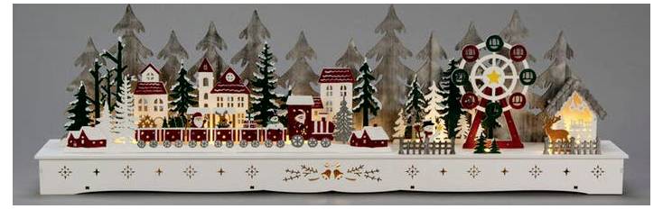Une scène de Noël en bois décorative avec des maisons, des arbres, un train et une grande roue, tous illuminés par un éclairage doux.