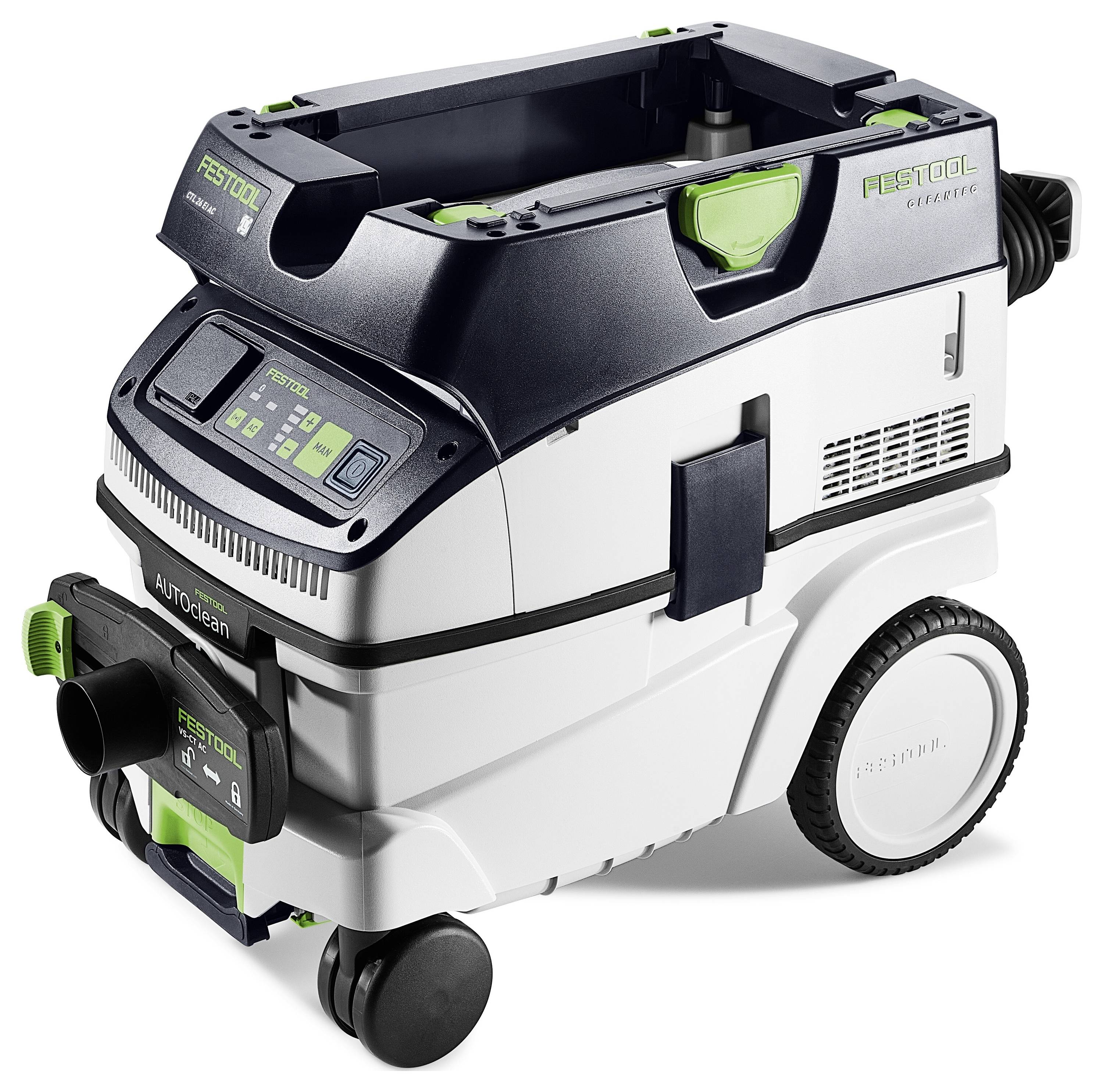 Un aspirateur industriel portable doté d'un affichage numérique, de grandes roues et des touches vertes, conçu pour des tâches de nettoyage intensives.