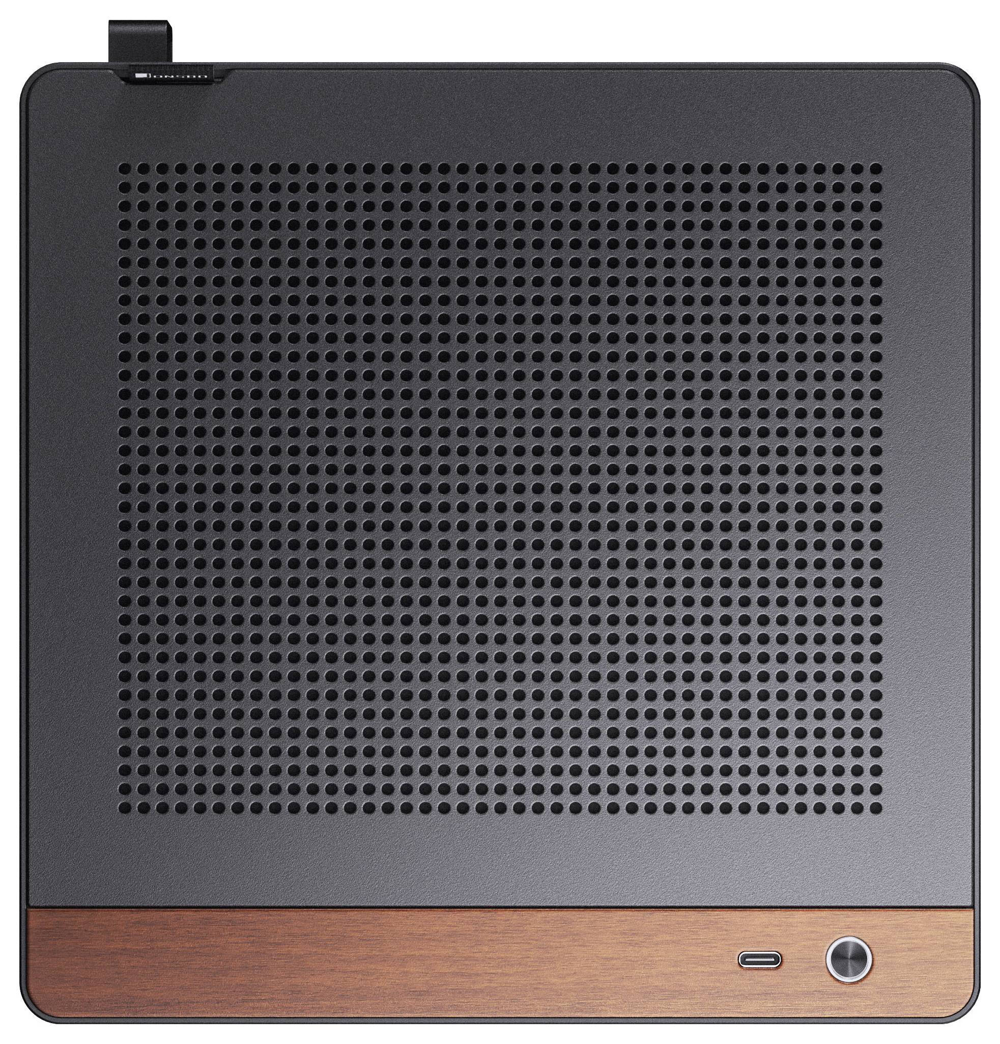 Un appareil électronique de forme carrée avec une surface noire perforée et une bordure en bois en bas, doté d'un unique bouton.