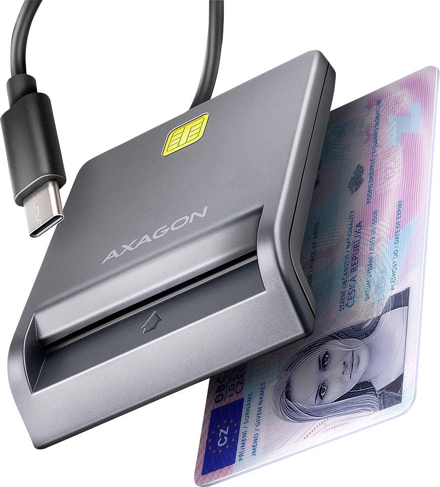 Un lecteur de carte connecté via USB lit une carte contenant une photo et du texte, suggérant un transfert d'informations personnelles.