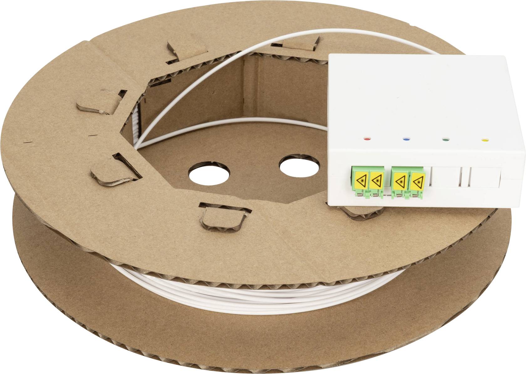 Un câble blanc enroulé sur un noyau en carton à côté d'un petit dispositif électronique blanc avec des voyants lumineux colorés et des symboles d'avertissement.