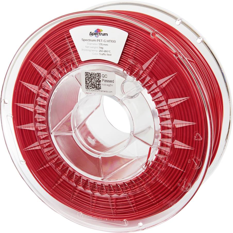 Un rouleau de filament d'imprimante 3D rouge étiqueté « Spectrum PET-G HT100 ». L'étiquette indique qu'il a un diamètre de 1,75 mm et pèse 1 kg.