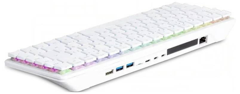 Un clavier compact blanc avec rétroéclairage arc-en-ciel, doté de plusieurs ports dont USB et HDMI sur le côté gauche.