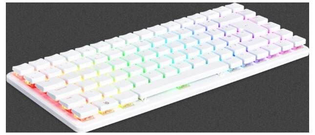 Un clavier blanc avec rétroéclairage RVB, affichant un spectre de couleurs de gauche à droite.