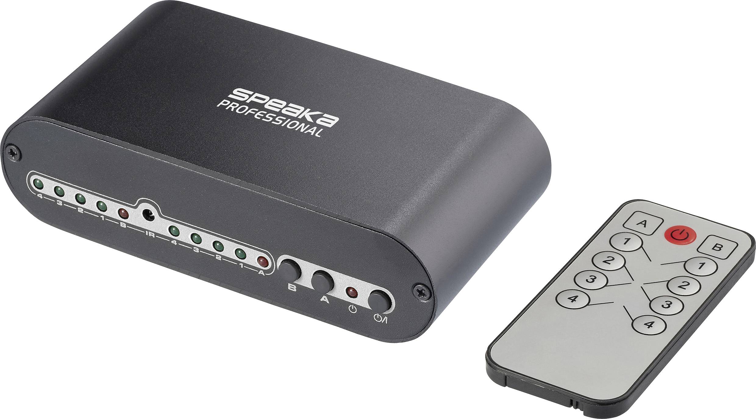 Boîtier de commutation audio « Speaka Professional » avec télécommande noire, affichant plusieurs options d'entrée avec des indicateurs LED et des boutons de contrôle.