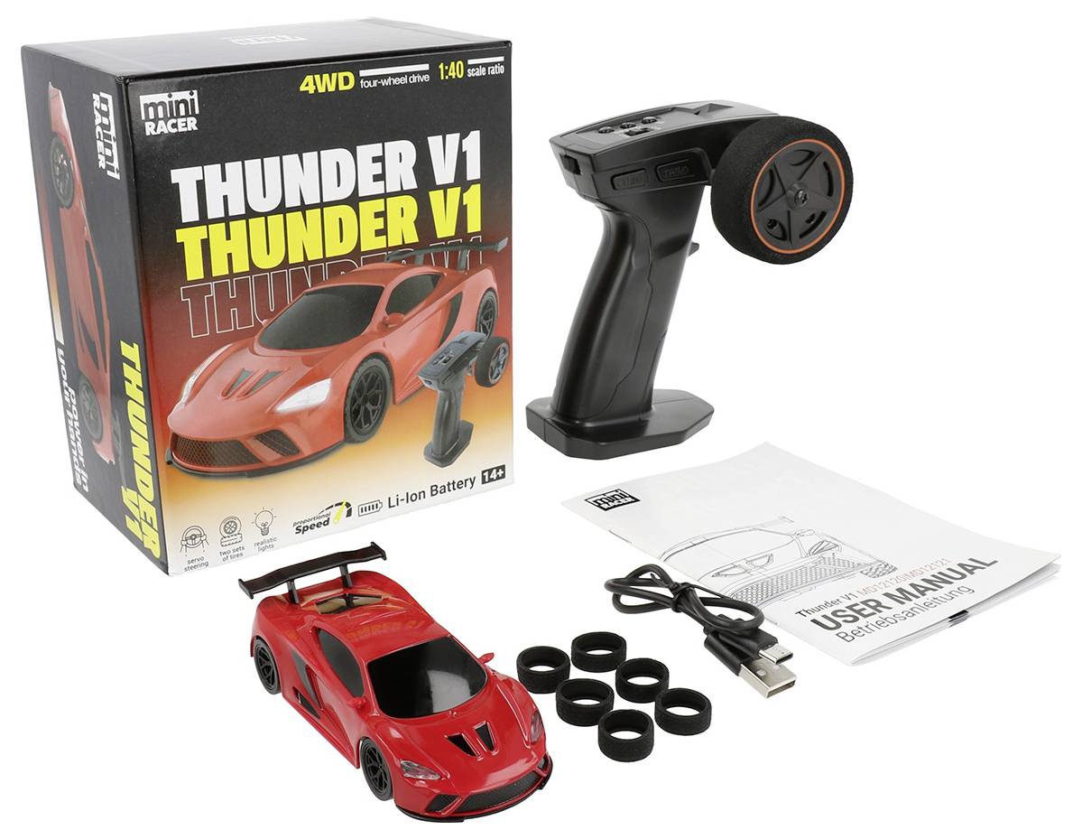 Kit de voiture télécommandée 'Thunder V1' rouge comprenant une voiture, une télécommande, des jantes, un câble USB et un manuel d'utilisation. La boîte présente une image de la voiture et ses caractéristiques.