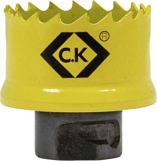 Un foret-scie jaune aux bords dentelés, portant un logo noir C.K, utilisé pour découper des trous précis dans différents matériaux.