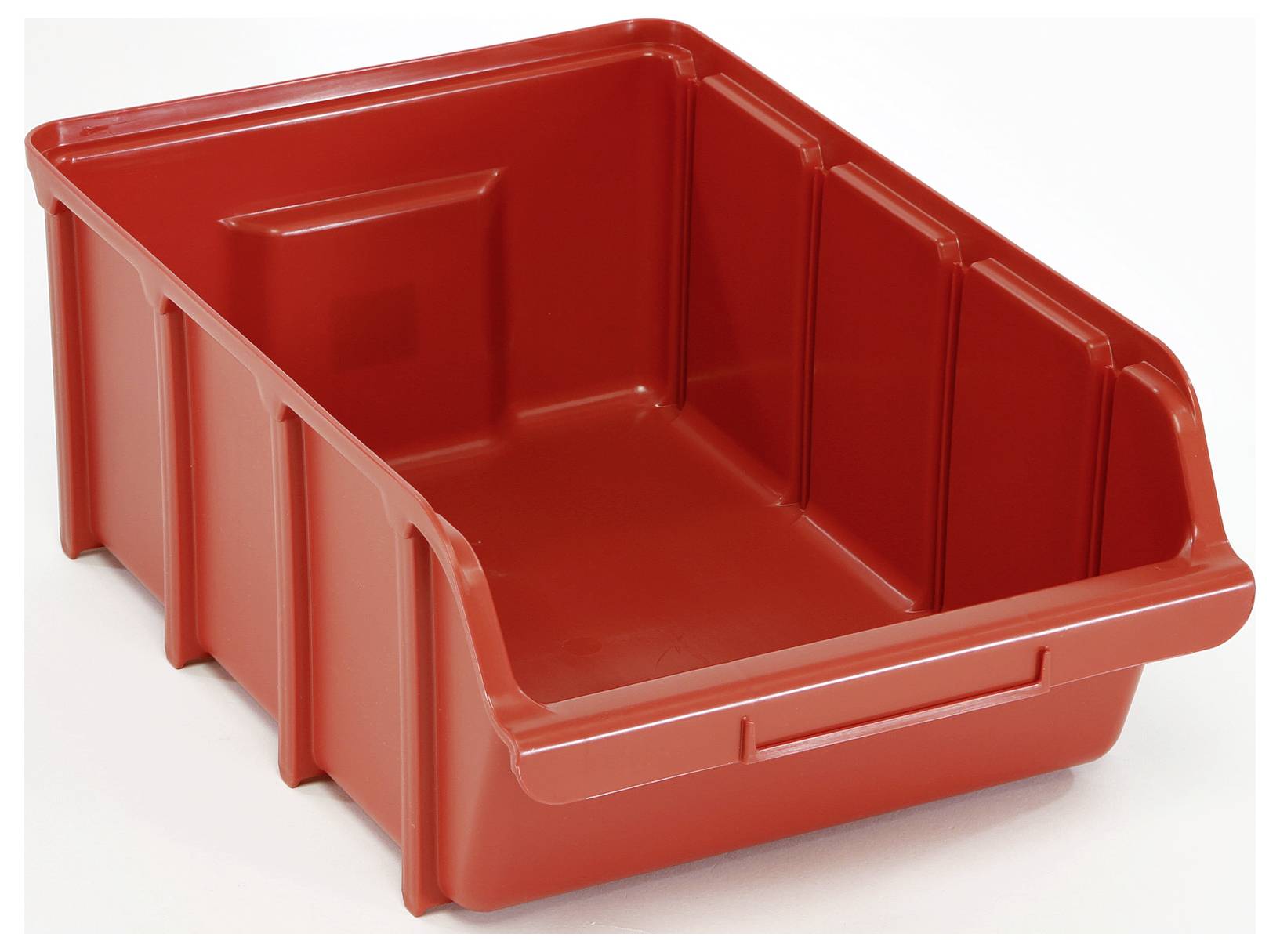 Un bac de rangement en plastique rouge avec des bords surélevés, conçu pour contenir et organiser de petits objets dans un atelier ou un espace de stockage.