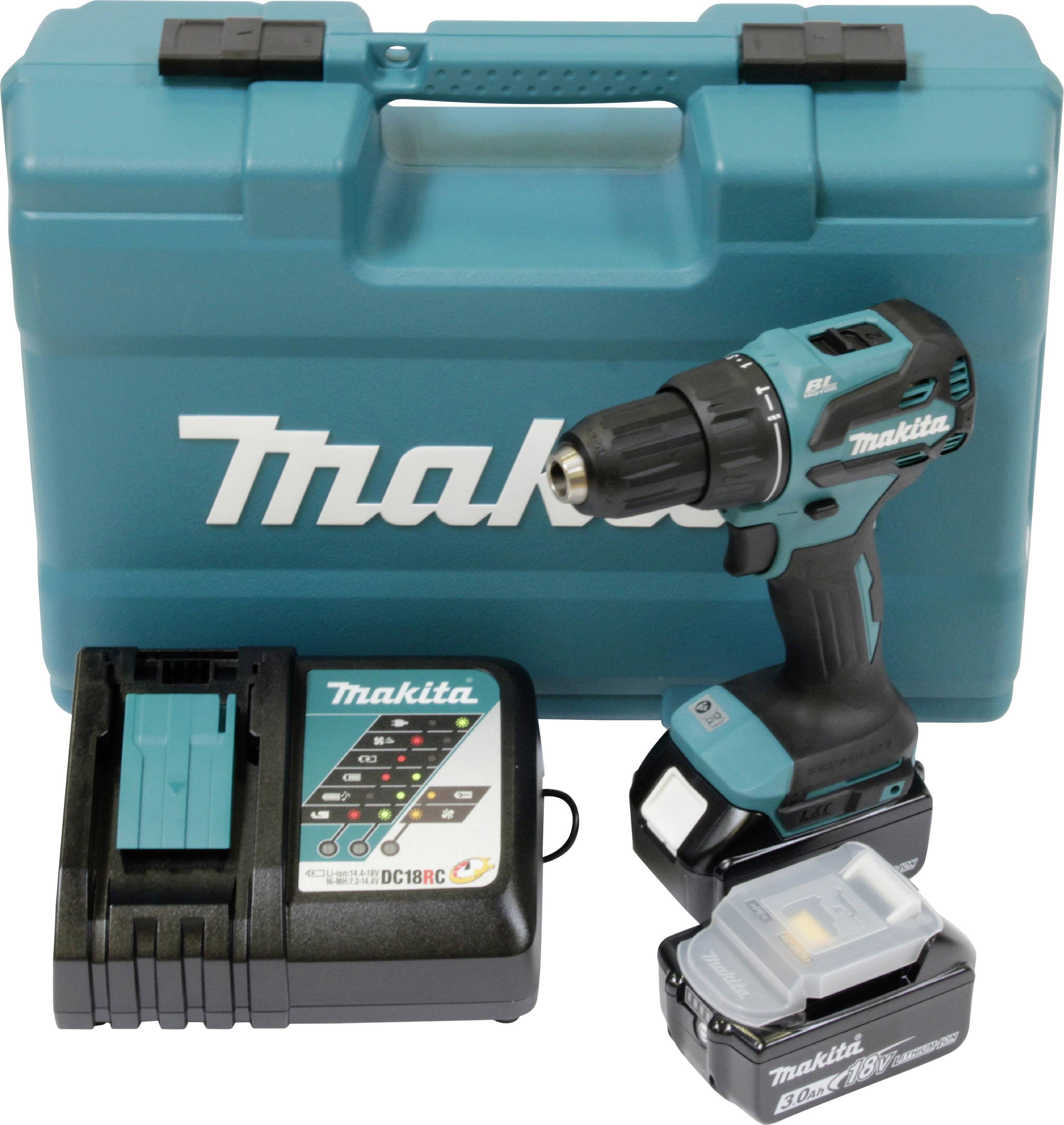 Ensemble perceuse sans fil Makita avec chargeur, batterie et étui de transport. La perceuse est bleu-vert et noire, mettant l'accent sur la portabilité et la puissance.