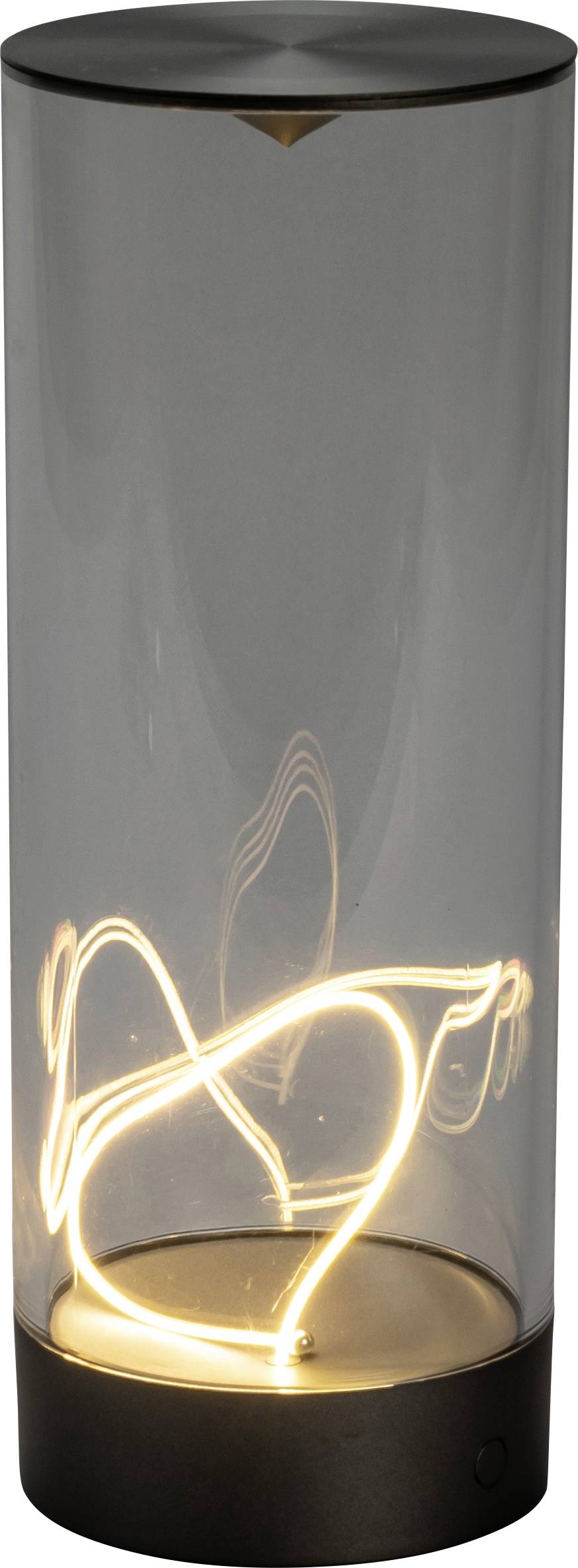 Une lampe cylindrique en verre avec un filament lumineux à l'intérieur, formant des lignes abstraites, posée sur un socle métallique lisse, sur un fond uni.