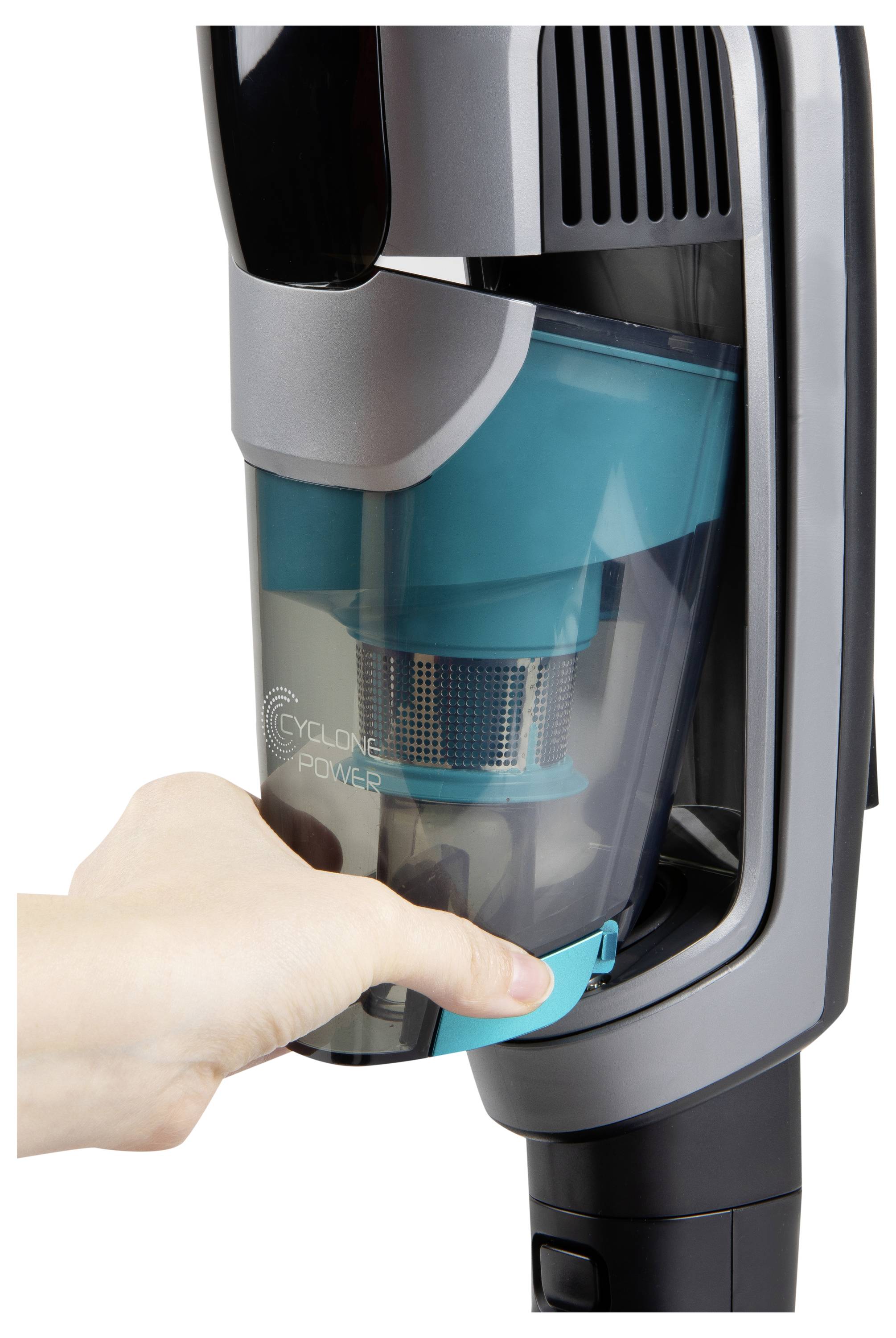 Une main retire le réservoir d'un aspirateur, démontrant la facilité de détachement pour le nettoyage ou la vidange.