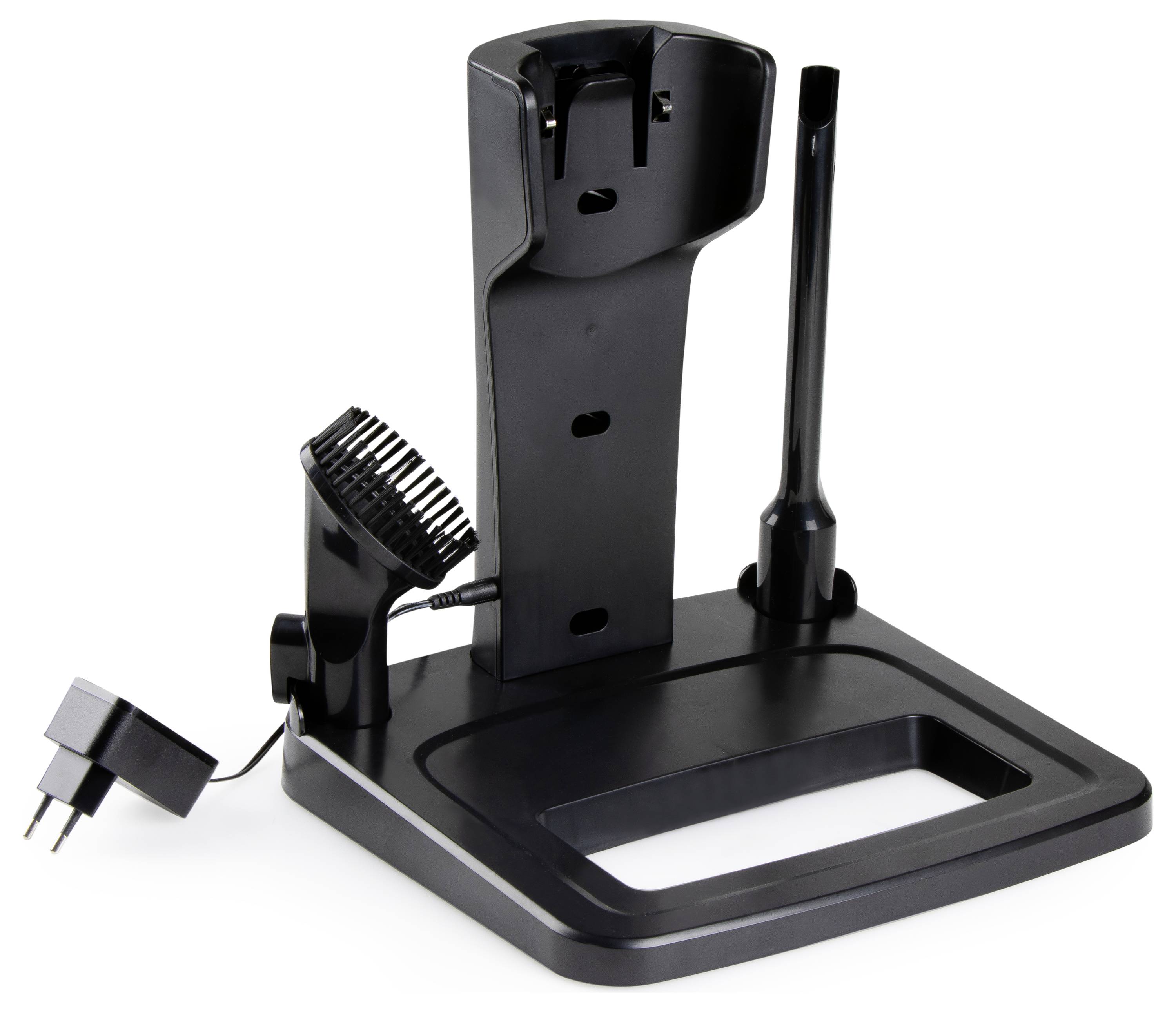 Support de tondeuse à cheveux noir avec port de charge et emplacements pour accessoires, comprenant un peigne et un embout, sur un fond blanc.