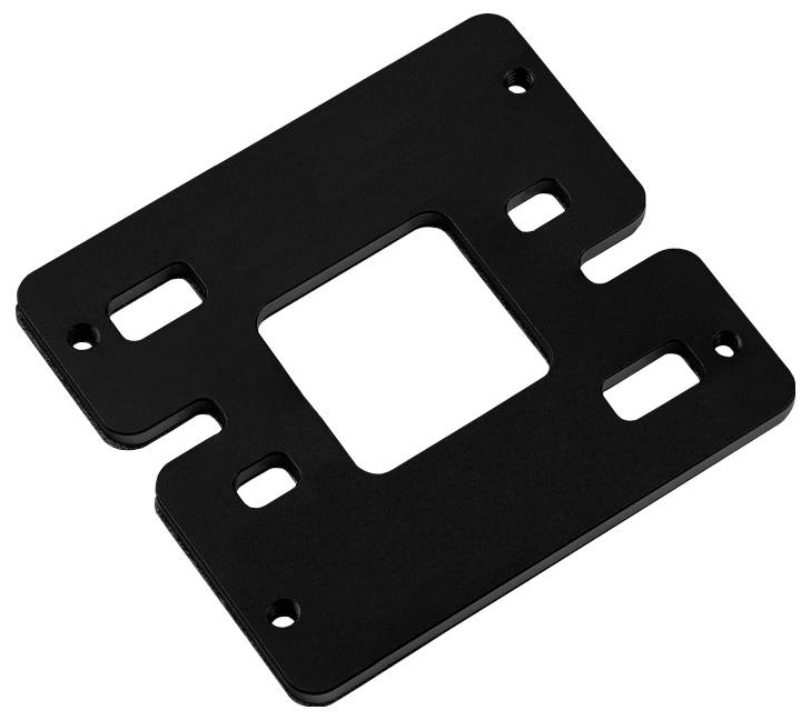 Un support de montage noir pour ordinateur avec plusieurs découpes et trous de vis, conçu pour fixer des composants de manière sécurisée.