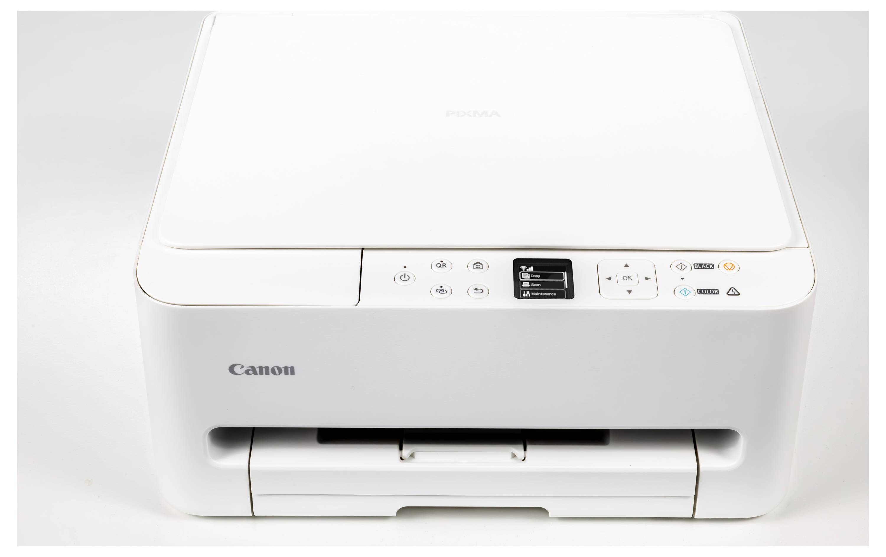 Une imprimante Canon blanche avec des boutons de commande et un écran sur le dessus, présentant un design épuré adapté à un usage domestique ou professionnel.