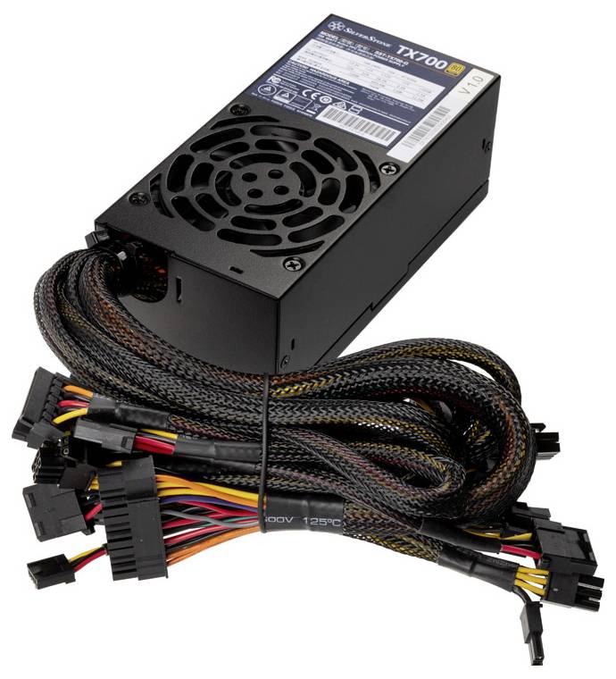 « Un bloc d'alimentation d'ordinateur avec plusieurs câbles et connecteurs colorés, étiqueté TX700, doté d'un ventilateur de refroidissement sur le dessus. »