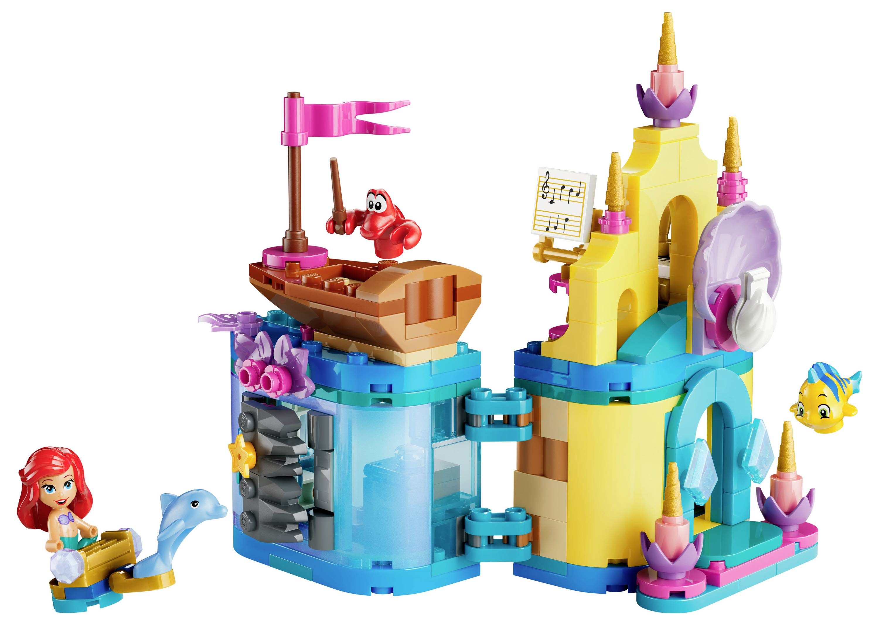 Ensemble de jouets représentant une scène sous-marine avec une sirène, un dauphin, un poisson jaune et un crabe rouge sur un bateau, comprenant des structures aquatiques colorées.