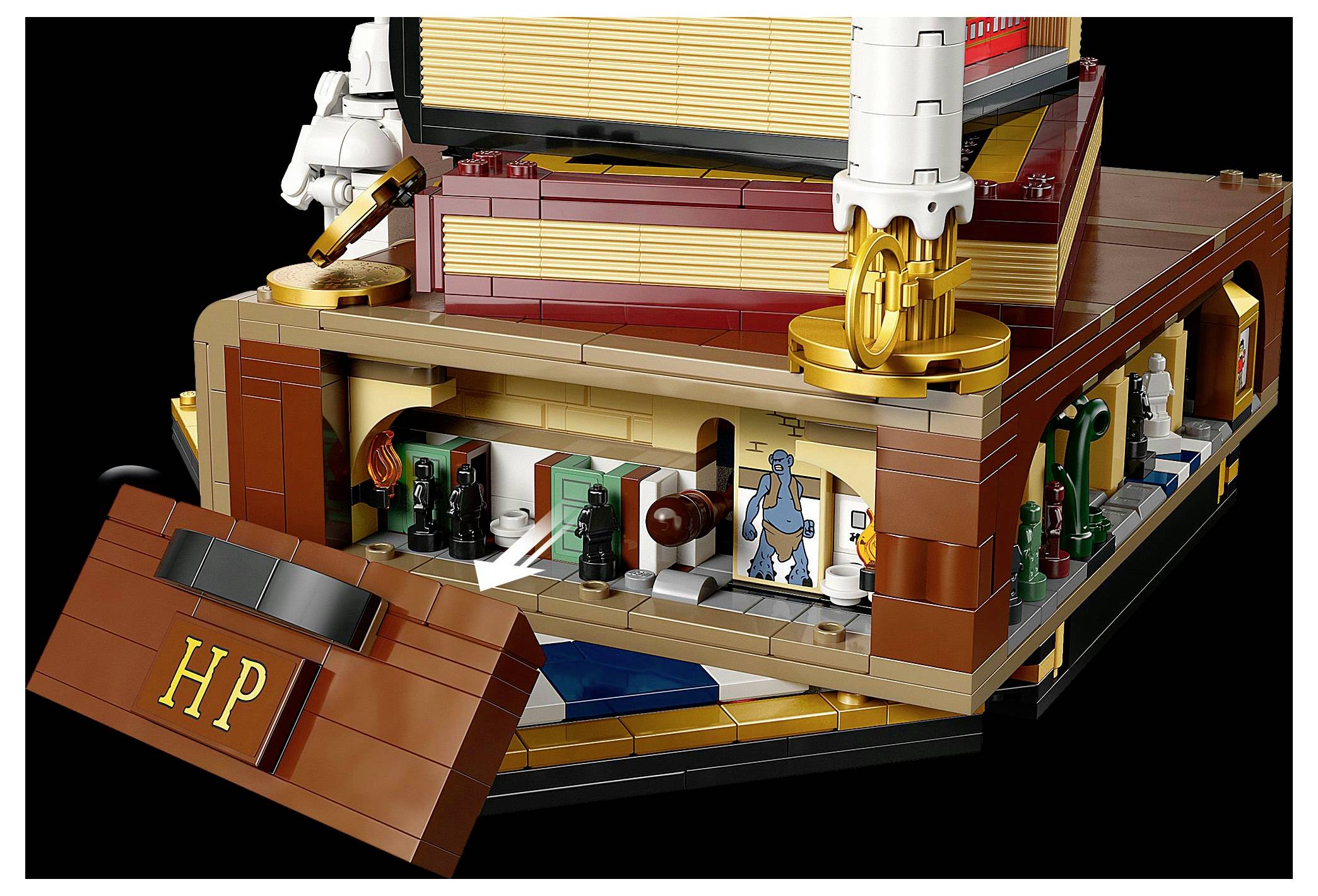 Une section de modèle LEGO détaillée représentant une scène de bibliothèque magique, avec des livres miniatures, des personnages et des éléments de décor, mettant en valeur des éléments de conception intriqués.