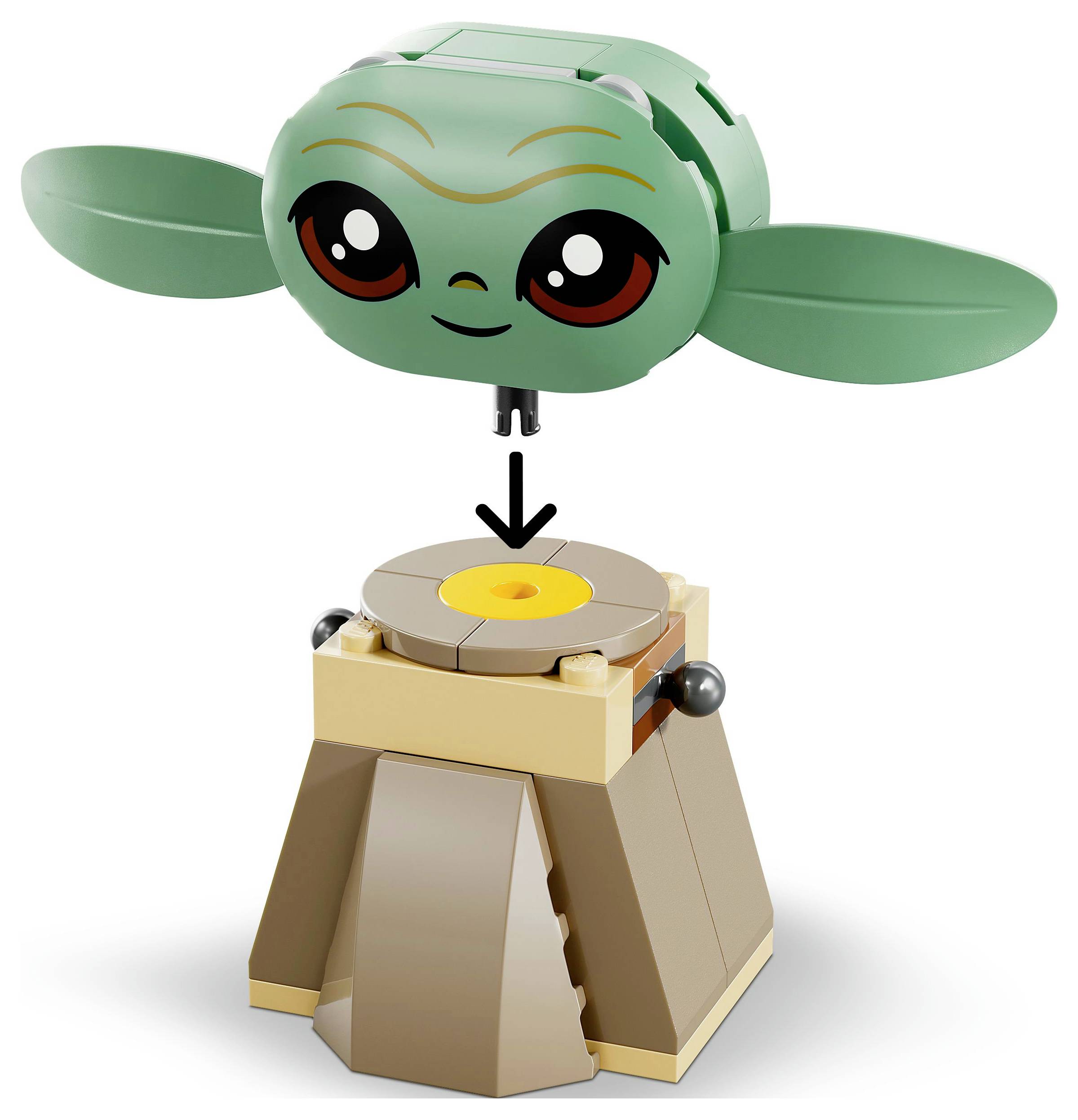 Un personnage LEGO vert avec une tête et de grands yeux flotte au-dessus d'un socle pyramidal marron, avec une flèche dirigée vers le bas indiquant l'assemblage.
