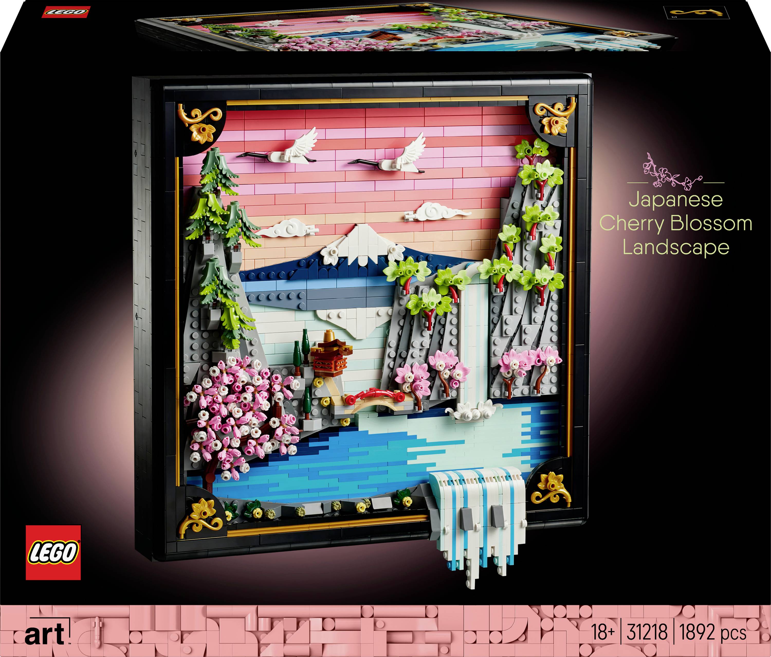 Œuvre d'art LEGO représentant un paysage japonais de cerisiers en fleurs avec une cascade, le mont Fuji et des oiseaux sur un fond de ciel rose.