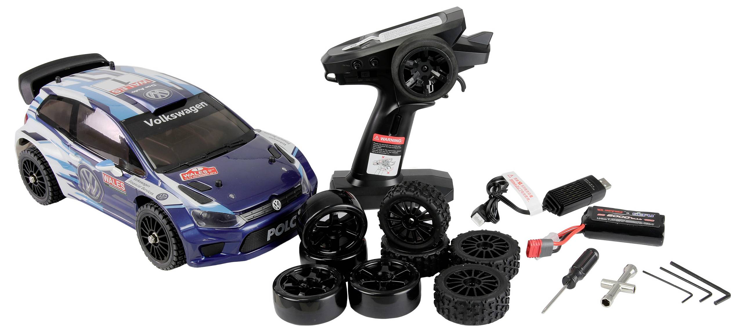 Une voiture miniature Volkswagen bleue et noire, comprenant une télécommande, des roues supplémentaires, un pack de batteries, un chargeur USB et un petit ensemble d'outils.