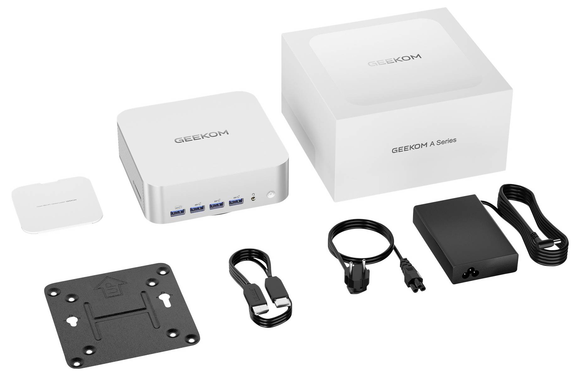 Un mini PC doté de plusieurs ports USB, présenté avec son adaptateur secteur, son câble, sa plaque de fixation et sa boîte d'emballage portant l'étiquette « Série A GEEKOM ».