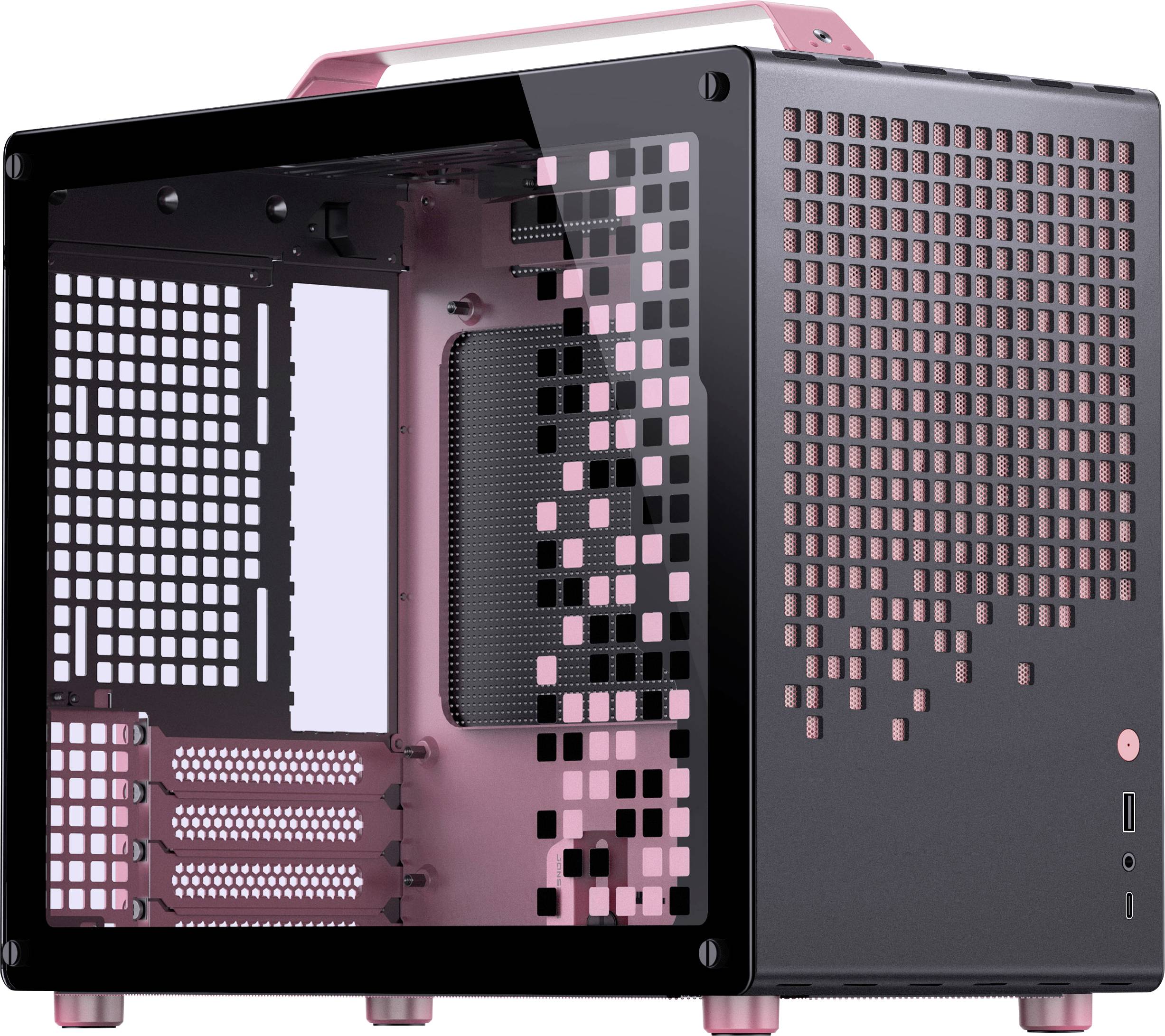 Un petit boîtier d'ordinateur cubique avec un schéma de couleurs noir et rose, présentant un design perforé sur le panneau latéral et une poignée rose.