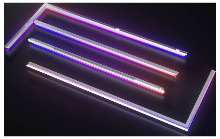 Des bandes lumineuses LED illuminées forment un design abstrait sur une surface sombre, présentant une gamme de couleurs allant du bleu au rouge.