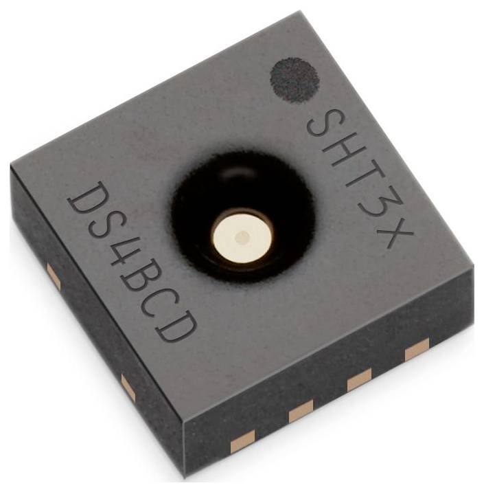 Un capteur électronique noir et carré avec des inscriptions « SHT3X » et « DS4BCD » sur le dessus, présentant des contacts en cuivre visibles sur les côtés.