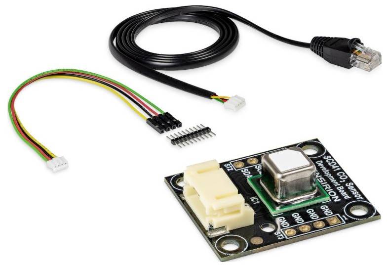 Module de capteur CO2 avec câbles de connexion et broches, utilisé pour détecter les niveaux de dioxyde de carbone dans diverses applications.