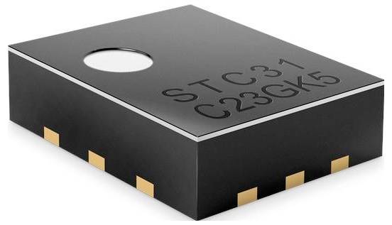 Un petit composant électronique noir étiqueté 'STC 31 C23GK5' avec plusieurs connecteurs dorés, probablement utilisé pour des applications technologiques.