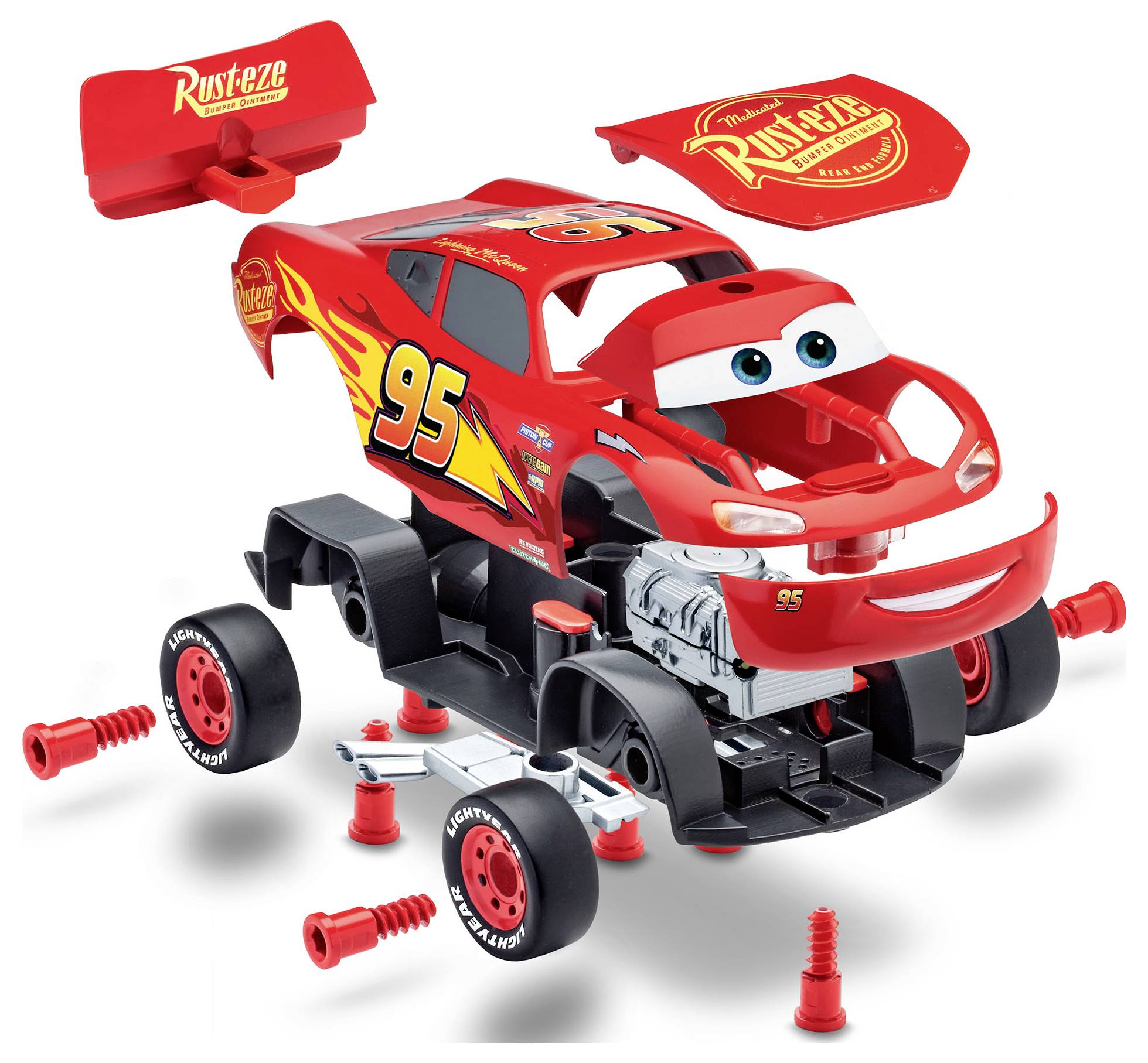 Une voiture de jouet rouge avec des traits de personnage, étiquetée 'Rust-eze' et le numéro '95', présentée démontée avec le moteur et les roues séparés.