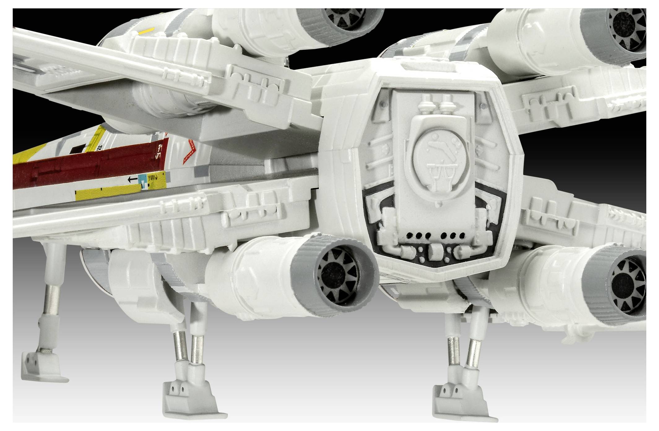 Un modèle détaillé d'un vaisseau spatial futuriste doté de quatre moteurs et d'un train d'atterrissage, présentant un corps principalement blanc avec des accents gris.