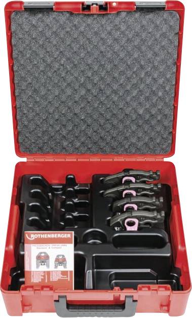 Boîte à outils rouge ouverte, montrant des compartiments organisés avec divers outils noirs et roses et un manuel 'Rothenberger' à l'intérieur.