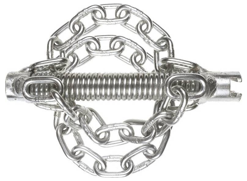 Un piège à mâchoires métallique avec des chaînes circulaires et un mécanisme à ressort au centre, utilisé pour capturer et immobiliser des animaux.