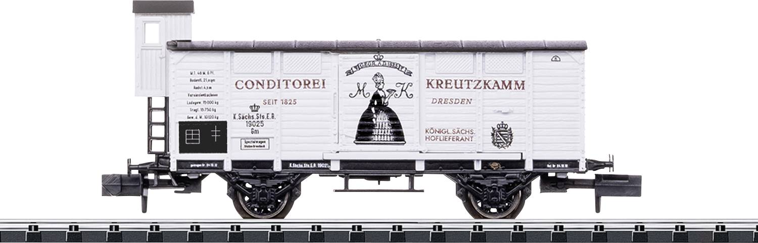 Wagon de modèle réduit ferroviaire de marchandises portant la marque historique « C. A. Kreutzkamm Conditorei Dresden » et présentant une illustration vintage sur une voie ferrée.