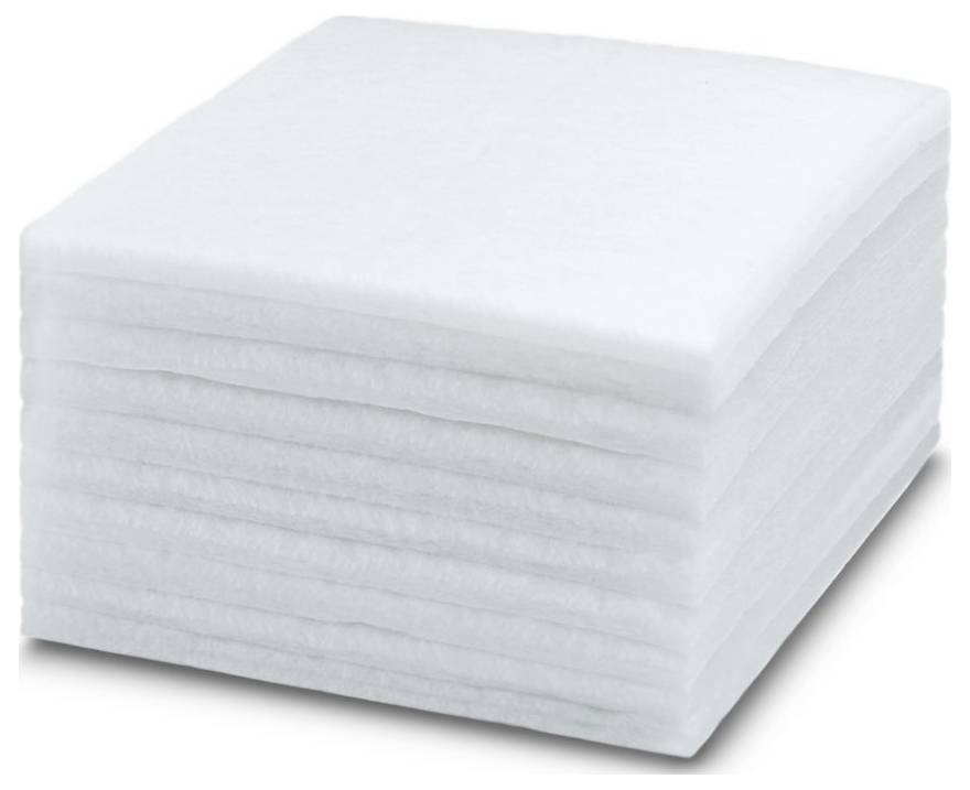 Un rouleau d'étiquettes blanches vierges, partiellement déroulé, avec des étiquettes rectangulaires visibles en rangées.