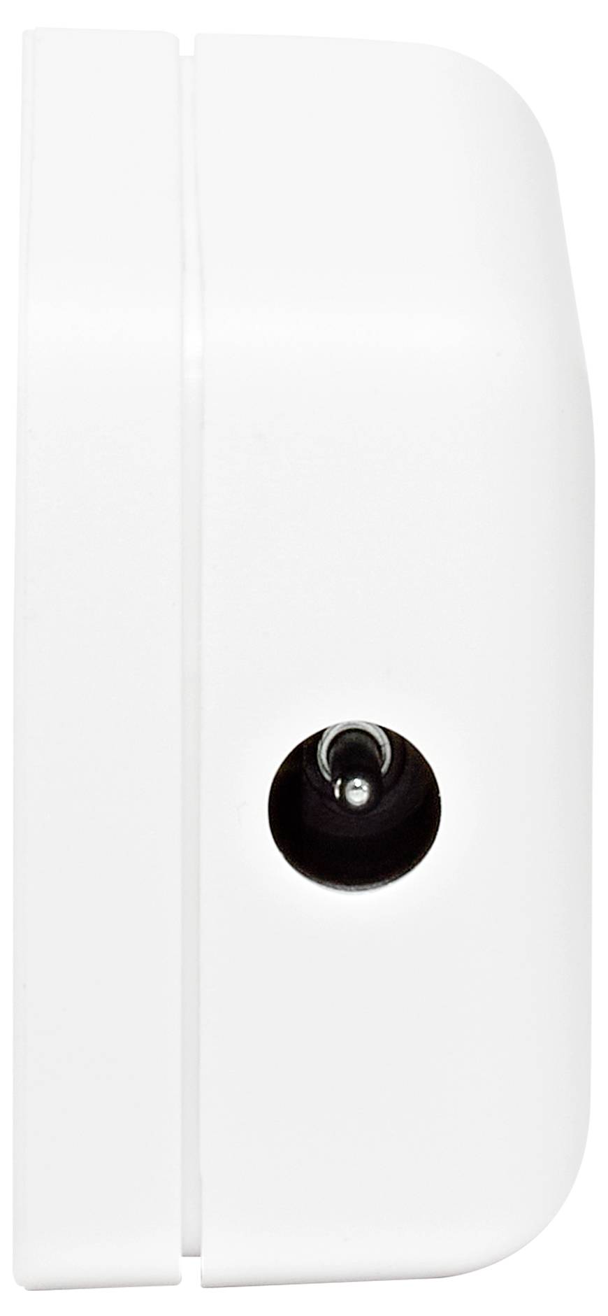 Un gros plan d'un appareil blanc monté sur un mur, probablement un capteur ou un bouton, avec un petit objectif ou bouton circulaire sombre sur son côté.