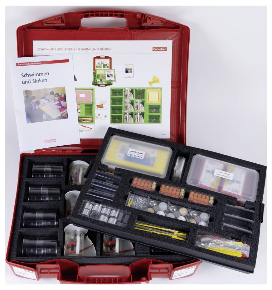 A red educational kit labeled 'Floating and Sinking' containing various scientific experiment tools and a booklet titled 'Schwimmen und Sinken'.